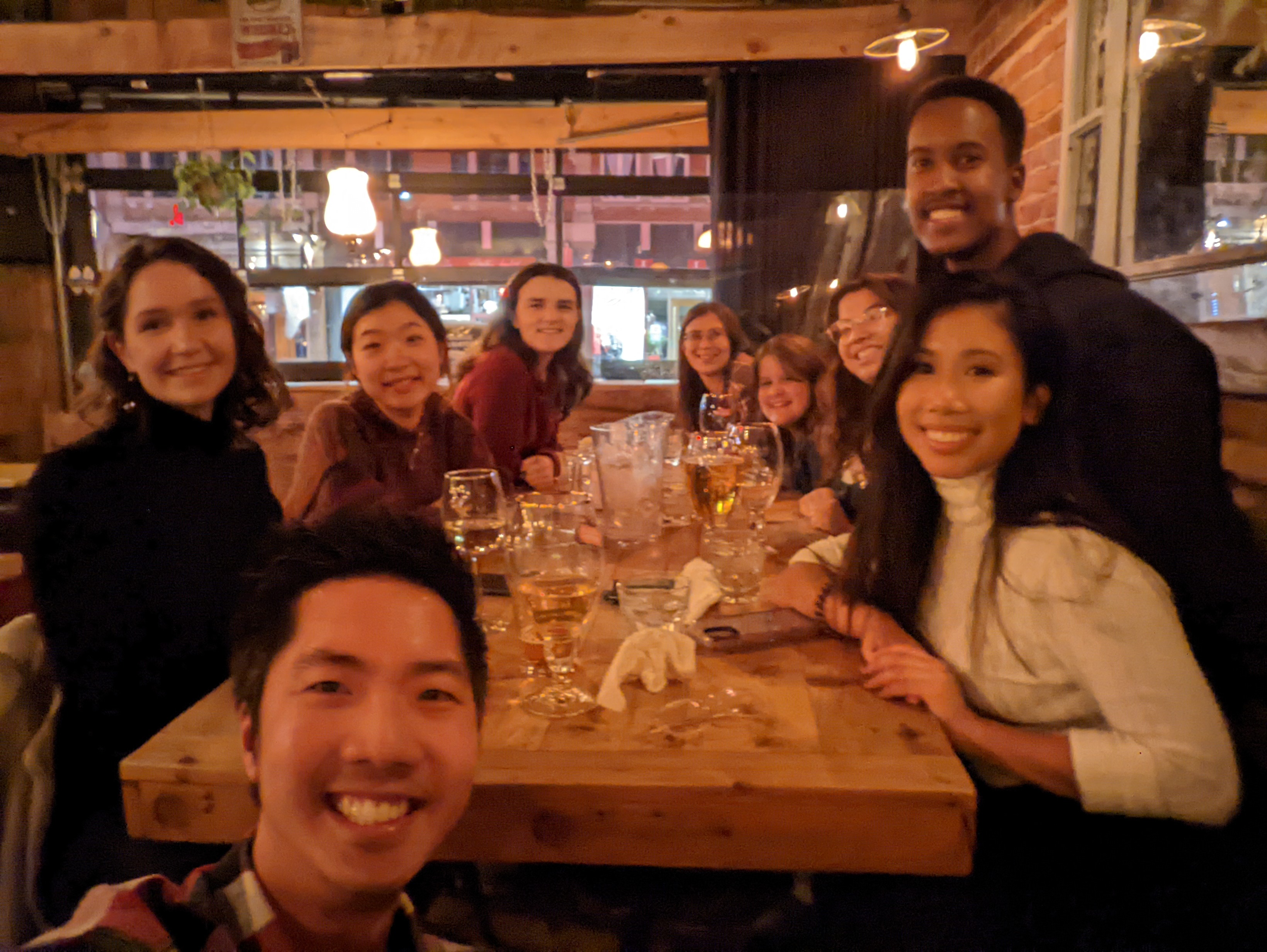 a group of friends posing for a picture at the western bar in Trois-Rivieres